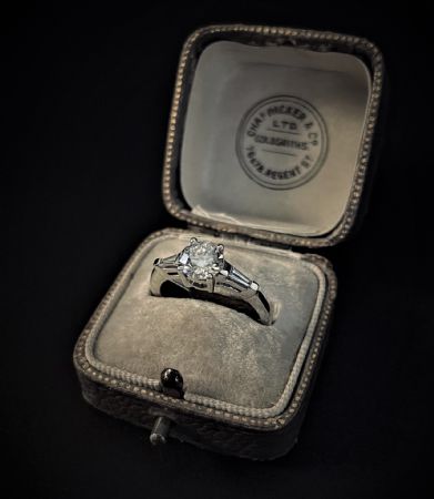 Solitaire Ring with Diamonds