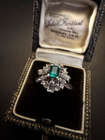Platinum Ring with Emerald and Diamonds